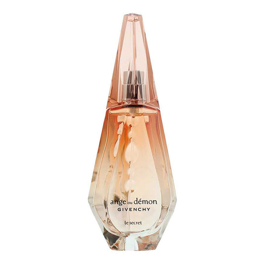 Givenchy Angel & Démon perfume bottle in a faceted crystal design, filled with a peachy pink liquid and featuring a metallic silver spray nozzle, set against a plain white background.
