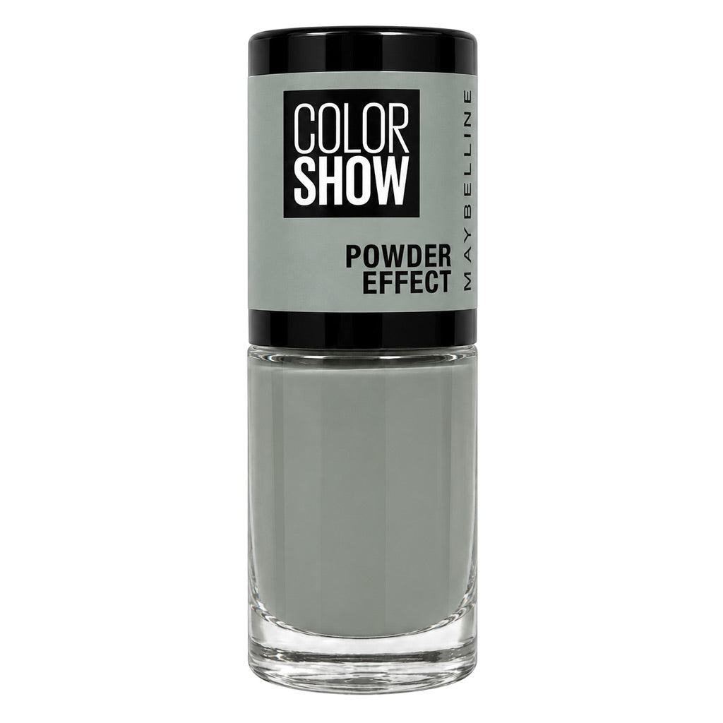 Maybelline Color Show Powder Effect nail polish in a clear glass bottle with a black cap, showing a light gray-green shade.
