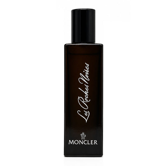 Moncler Les Roches Noires perfume bottle, a dark brown rectangular glass bottle with a black cap, featuring white script and logo text on a plain white background.