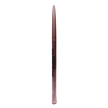 A single eyebrow pencil with a metallic rose gold casing, featuring black text that reads 'SUPER FINE BROW ENHANCER' and 'PRO MAXED OUT', shown vertically against a plain white background.