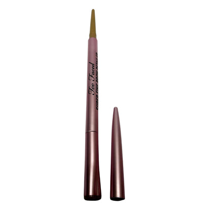 Too Faced Linedarker eyebrow pencil shown uncapped with the applicator tip removed and placed beside the barrel on a white background.